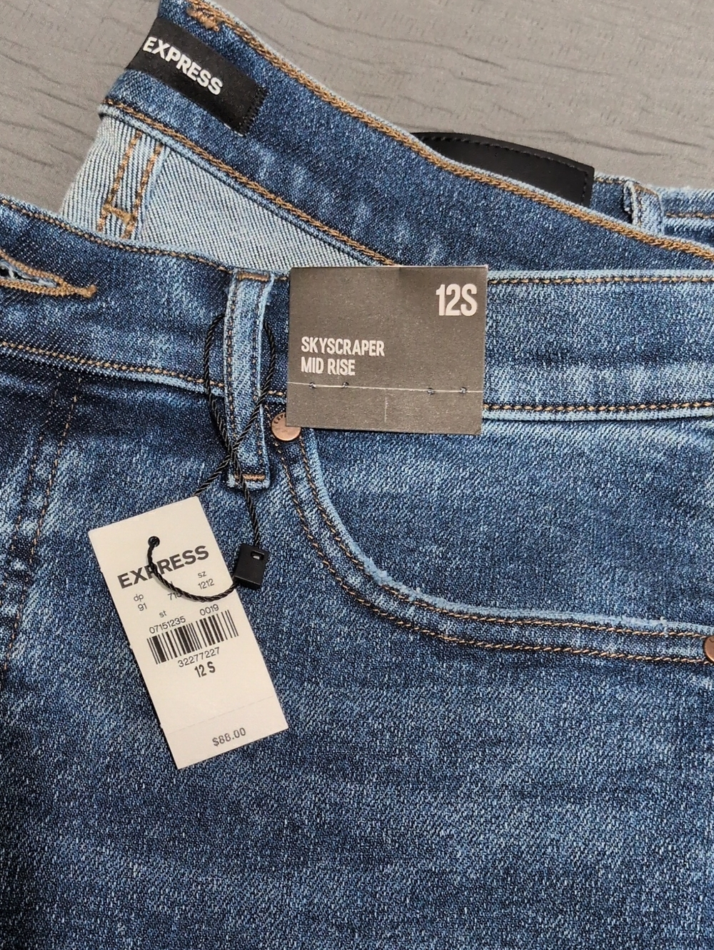 Express Women’s Skyscraper MID RISE Jeans in Blue Denim